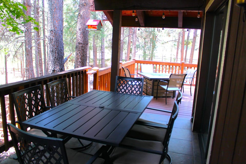 Side deck table seats up to 6.  Good for days that are rainy or too sunny.