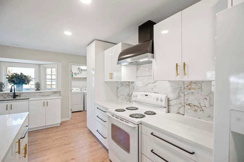 Brand new marble and metal luxury kitchen with everything you need to make some great memories (and meals)
