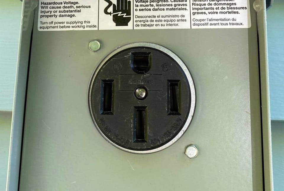 NEMA 14-50 Plug out side for fast charging with guest supplied charging cable