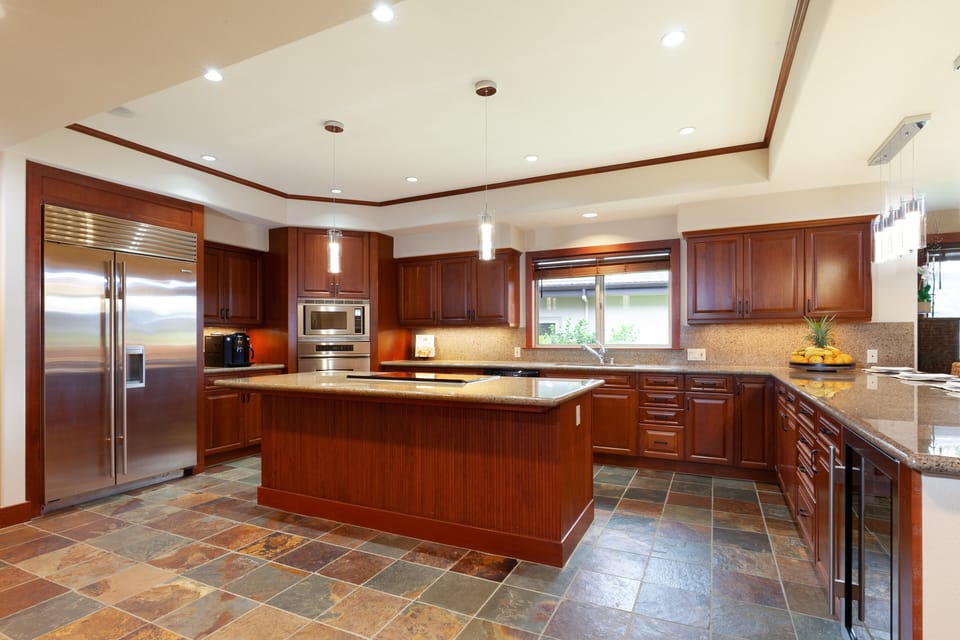 Spacious gourmet kitchen for prepping delicious island inspired meals