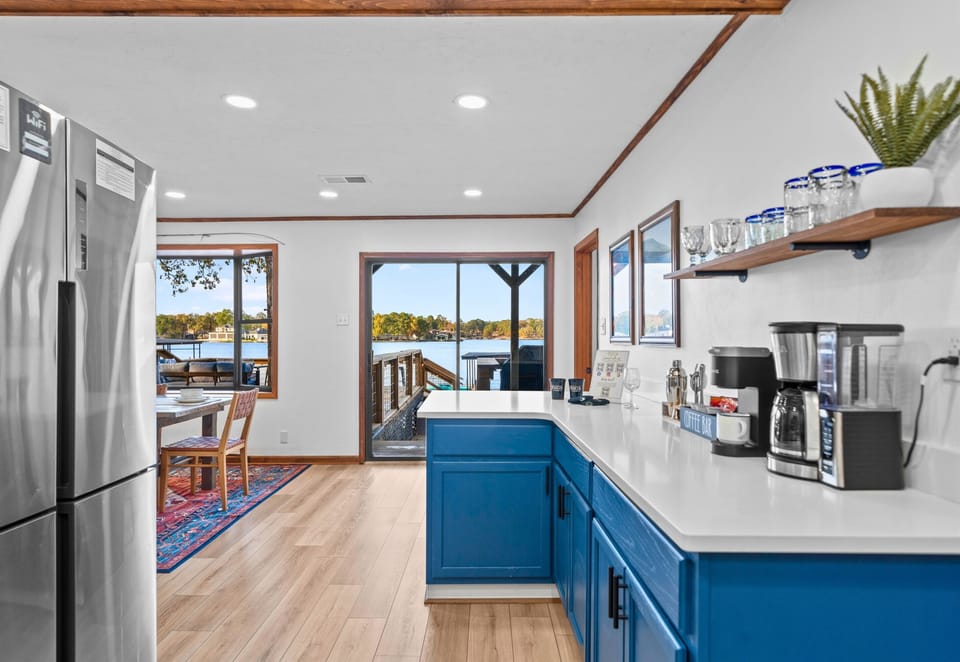 A bright and cozy dining nook with views of the outdoors, perfect for sharing meals, planning adventures, or simply enjoying each other’s company in a warm, inviting space.