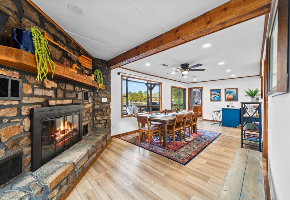 A cozy fireplace is the heart of this lounge area, adding warmth and charm to the room. It’s the perfect place to curl up on a chilly evening or spend time with family by the fire.