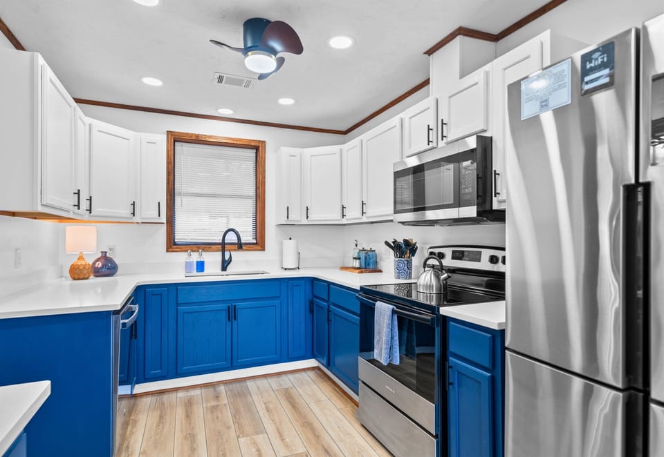 Clean lines, beautiful cabinetry, and spacious countertops make this kitchen a blend of form and function.