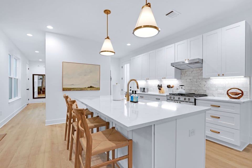 Whip up culinary masterpieces in the sleek, fully equipped kitchen