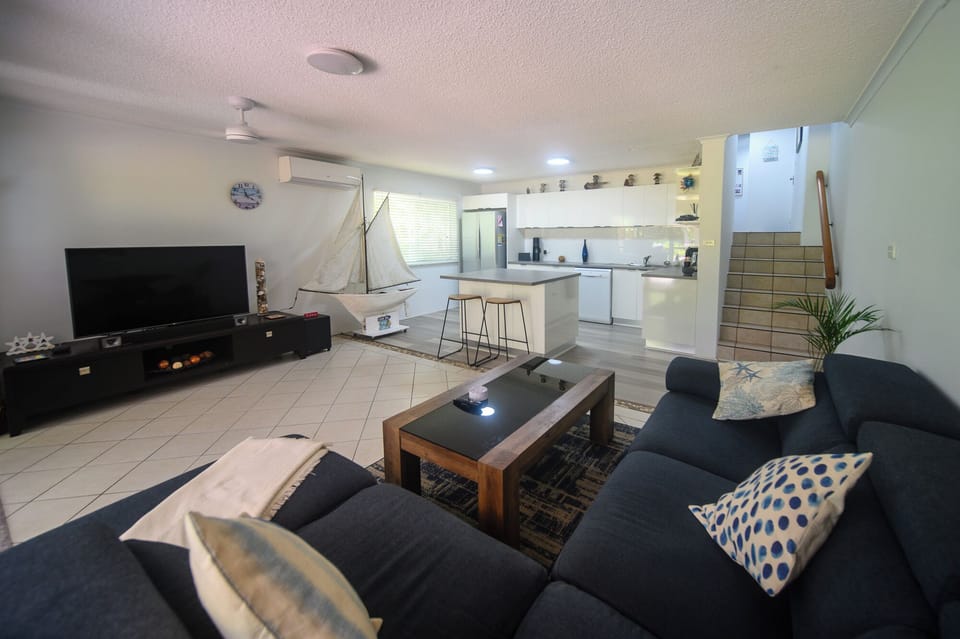 Open plan living room and kitchen.  