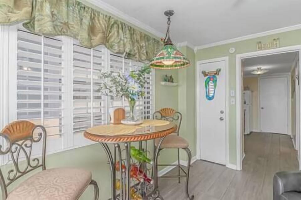 Dinning area with side street and living room views!