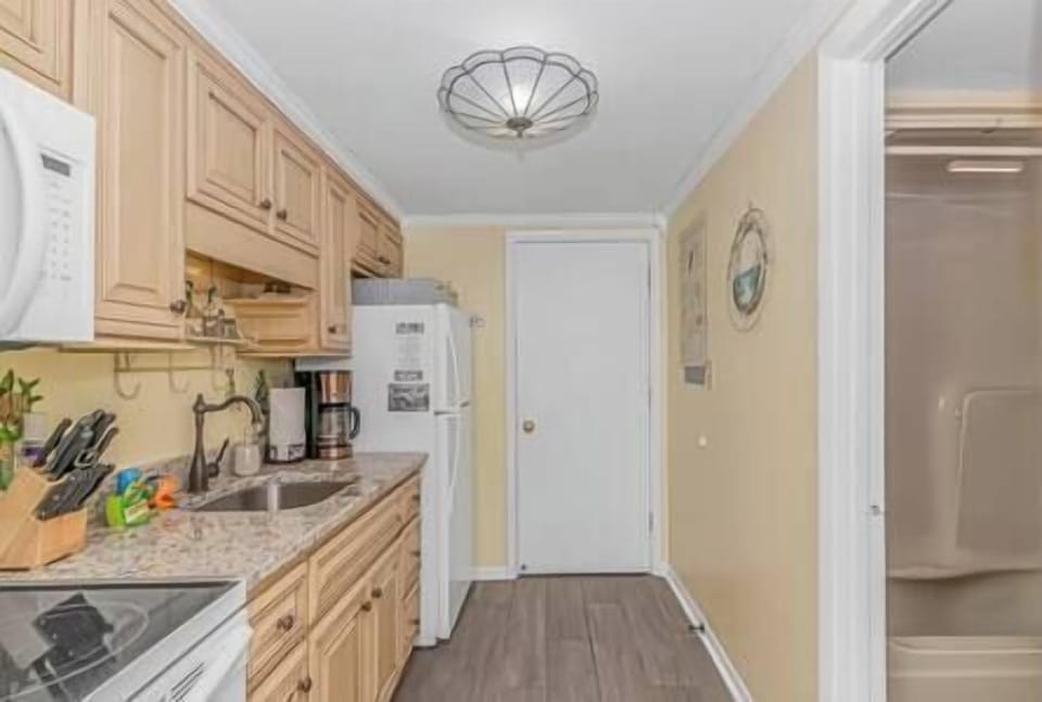 Kitchen has been thoughtfully planned out with lots of storage.