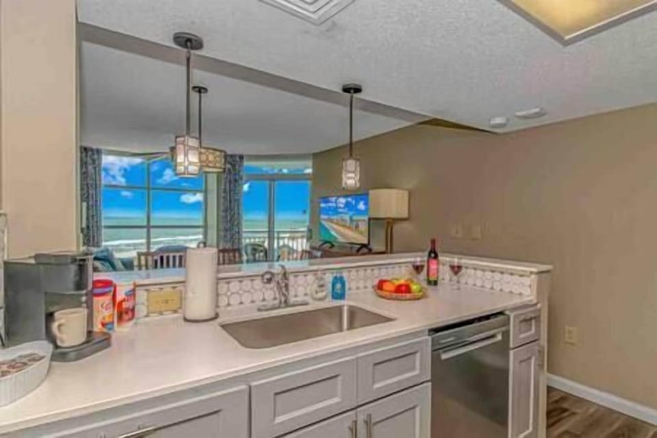 Updated coastal-style kitchen with stunning views of the ocean!