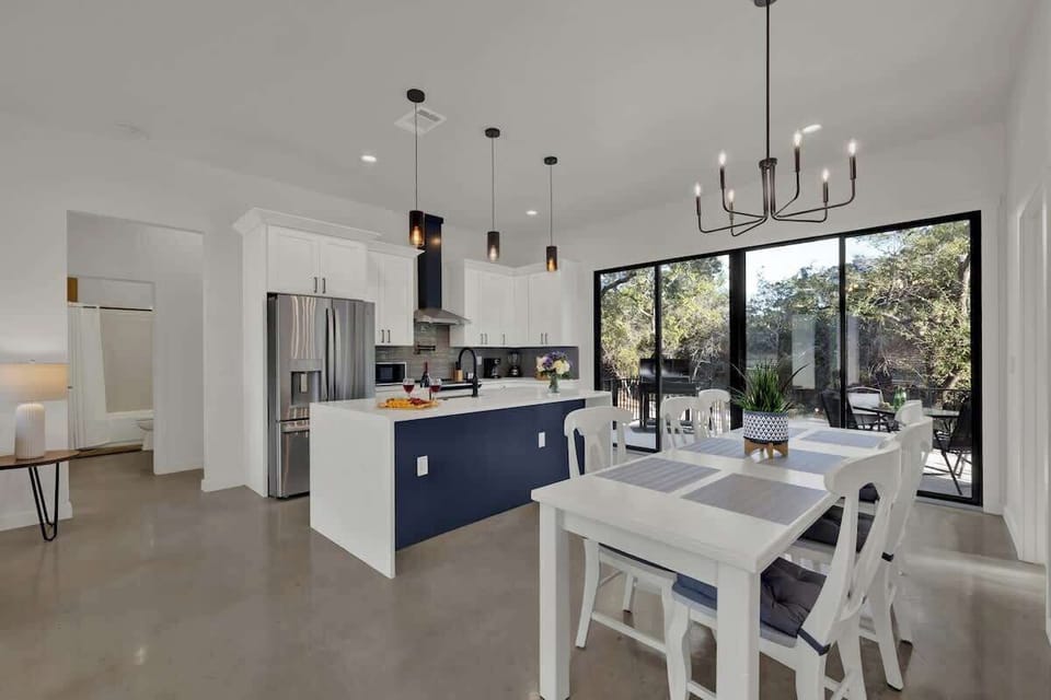 The kitchen features stainless steel appliances and plenty of counter space.