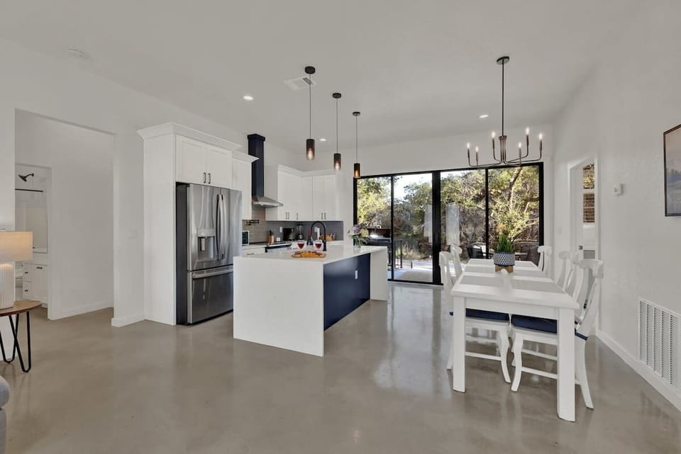 Kitchen and dining area with access to the back deck