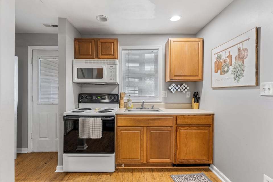 Minimalist kitchen with a clean design and efficient use of space.