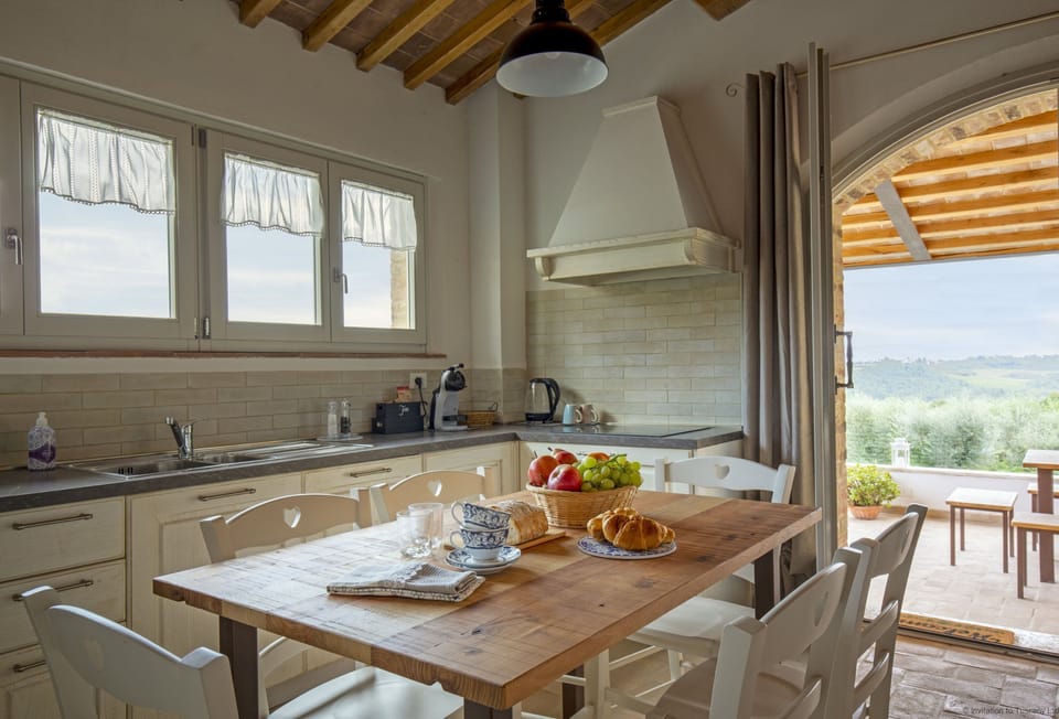 The kitchen is airy and well-equipped