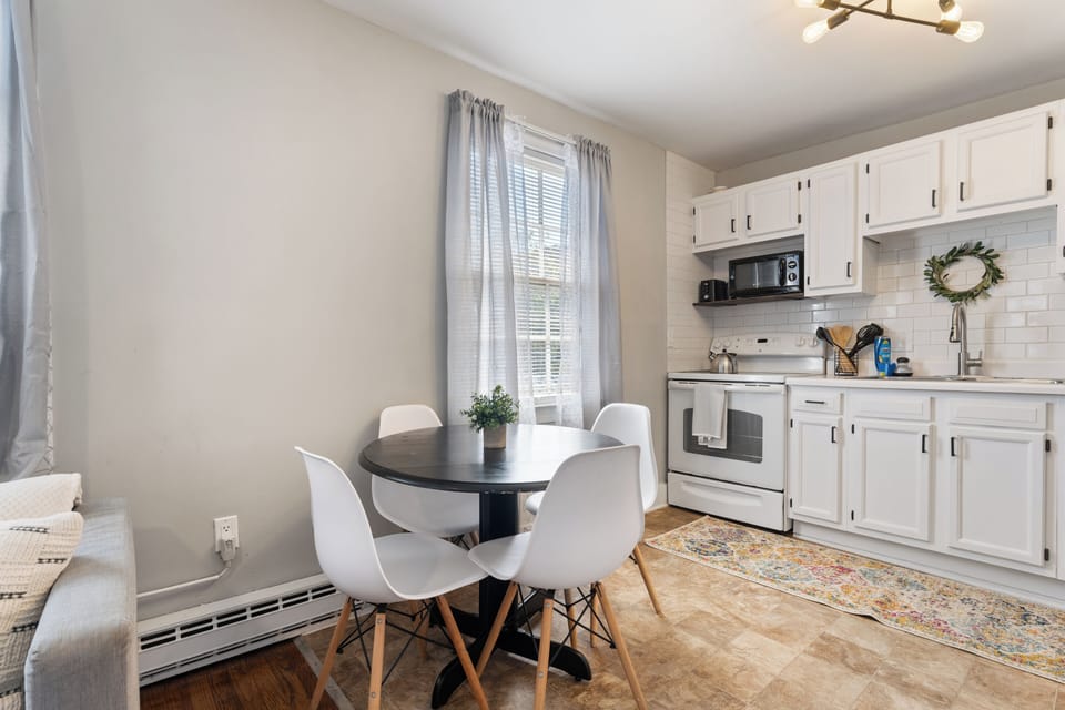 Open-concept layout connecting to the dining area.