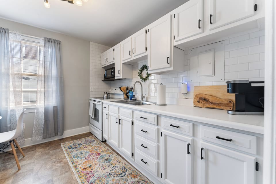Bright and modern kitchen with ample natural light.