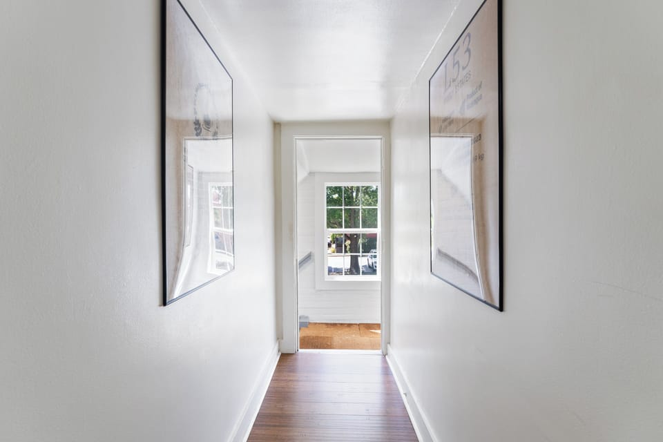 Bright and welcoming hallway with a modern, minimalist design.