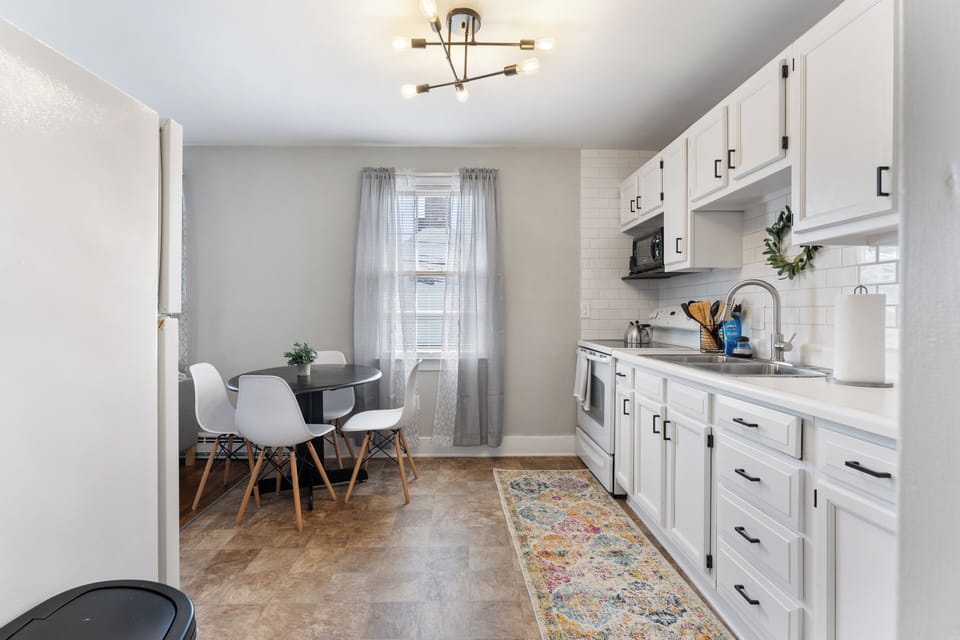 Sleek white cabinetry provides a clean, fresh look.