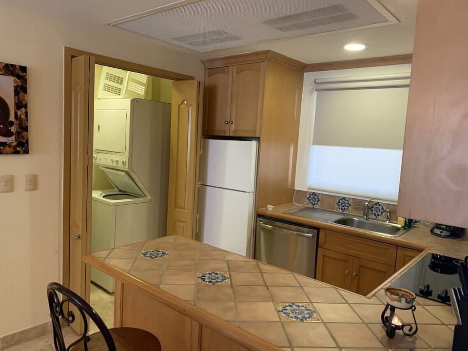 Full Kitchen w/Laundry Room