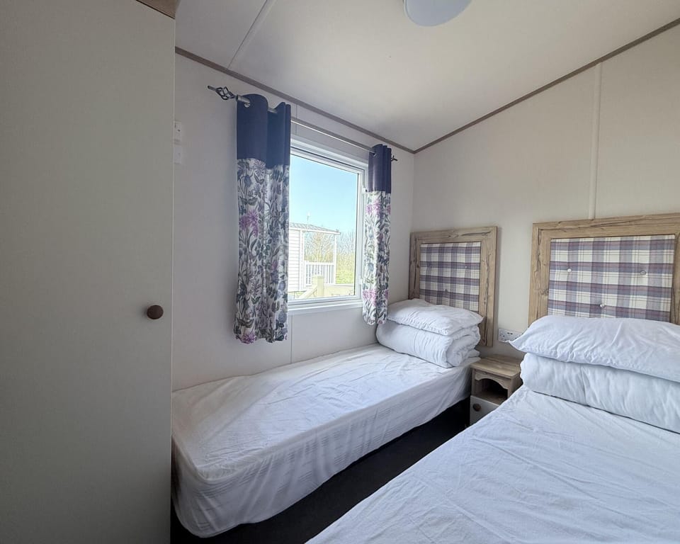 The twin room is ideal for the kids, let them unpack and call this room their own. You will sleep well knowing they are tucked up next door.