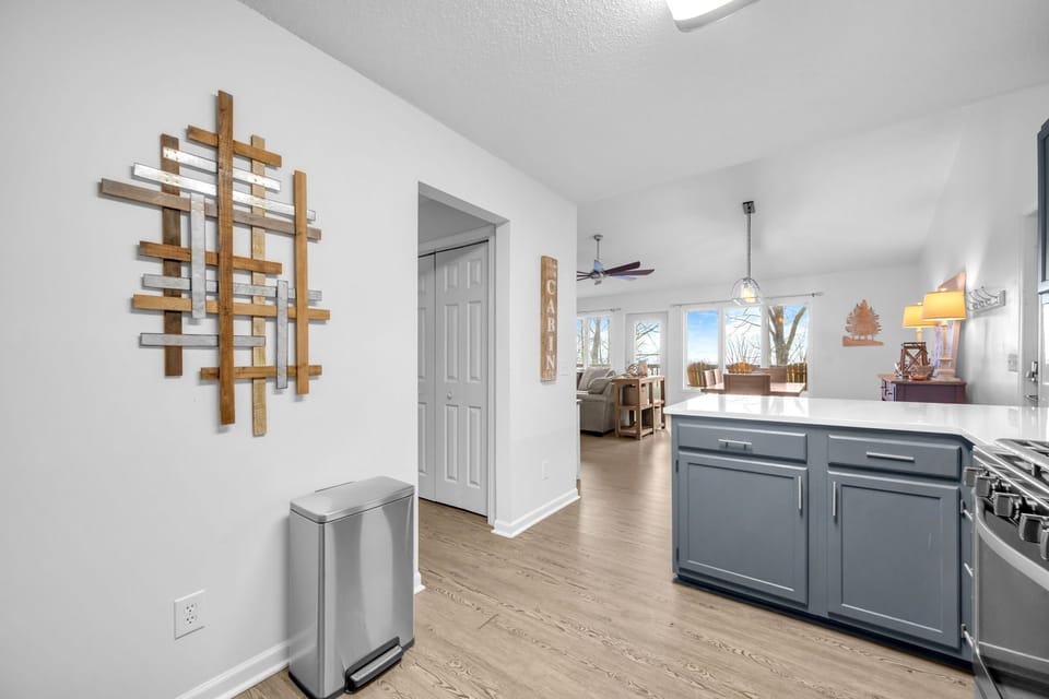 A bright kitchen layout with easy flow into the dining and living areas for a smooth group stay.