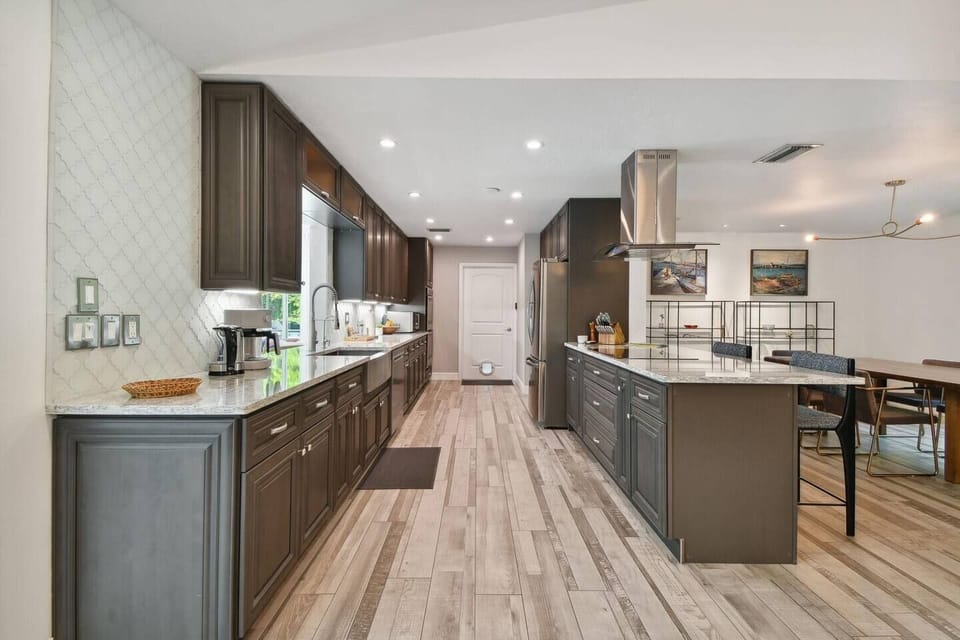 Spacious kitchen with granite counter tops