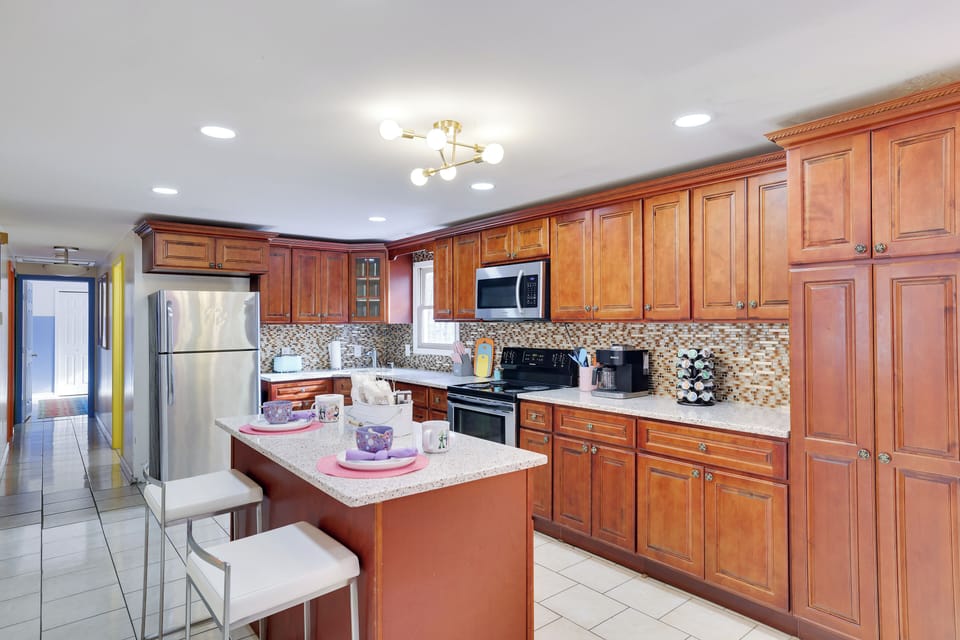 Spacious Kitchen: A fully equipped kitchen with