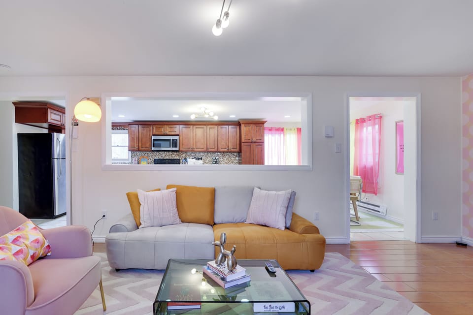 Open-Concept Space: Enjoy the open layout connecting the kitchen and living area