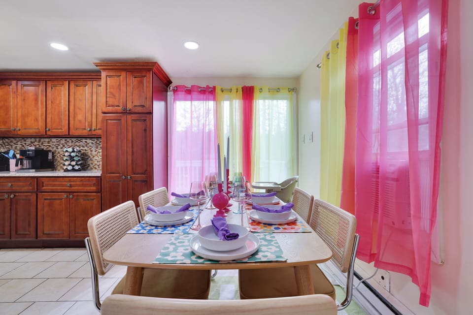 Dining Area with Bright Accents: Gather for meals in the colorful dining area