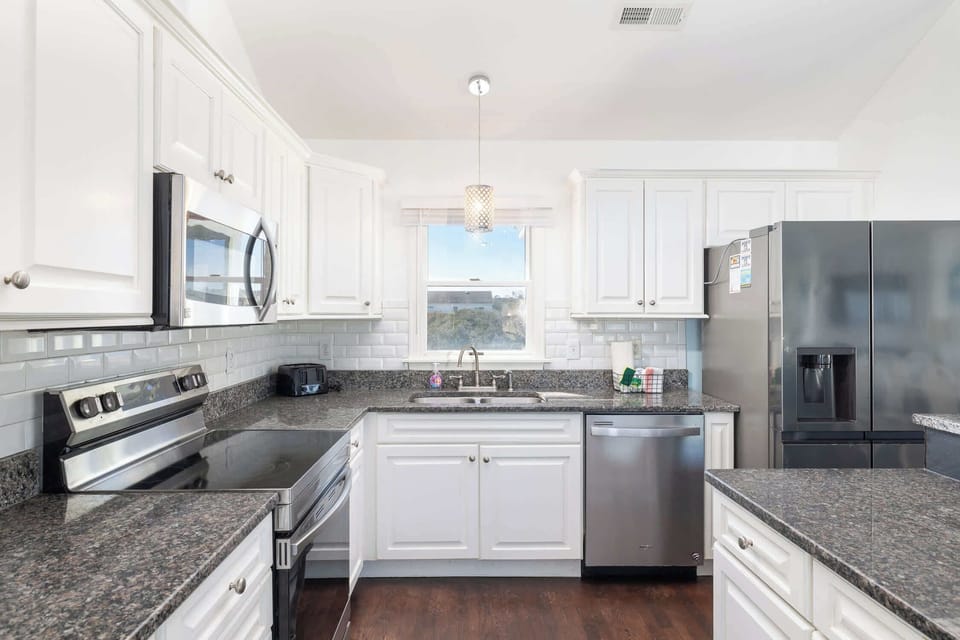Beautifully Stocked Kitchen w/ 2 Dishwashers, Refrigerator, Oven, Microwave, Sink, and Cooking Utensils