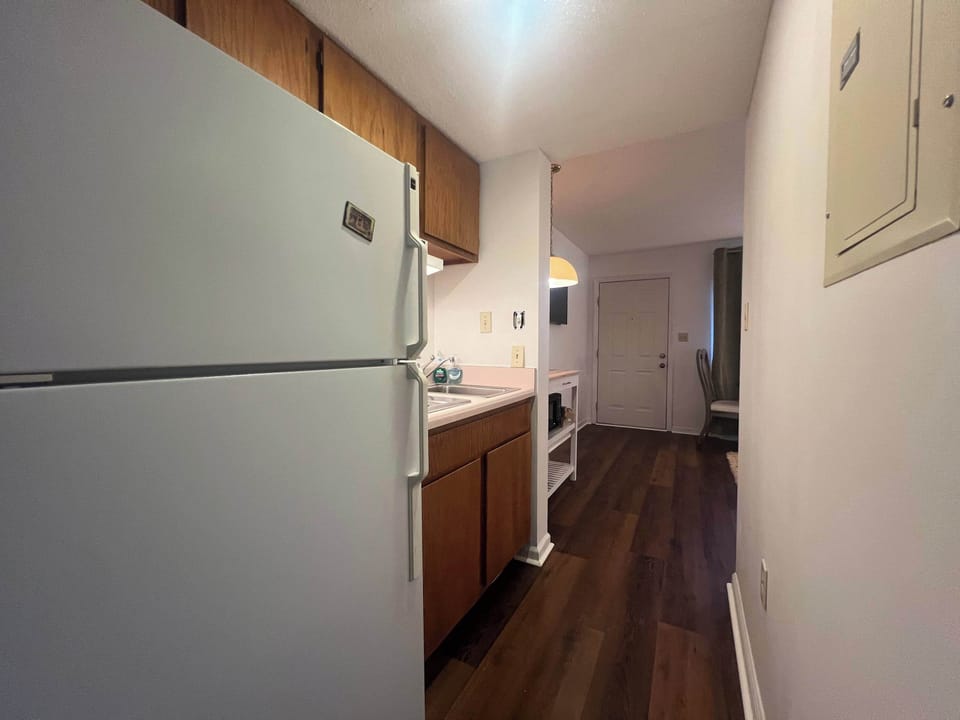 Prepare gourmet bites in the cozy galley kitchen