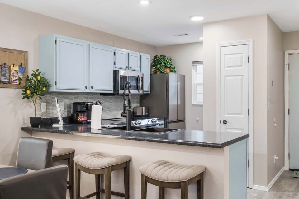 Sip morning coffee or grab a bite at the kitchen counter