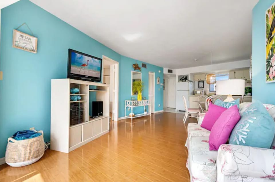 Unwind in our cozy living area featuring a TV for your entertainment
