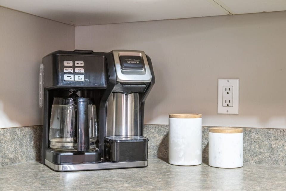 Full kitchen complete with a FlexBrew coffee maker (drip & K-pod enabled.)
