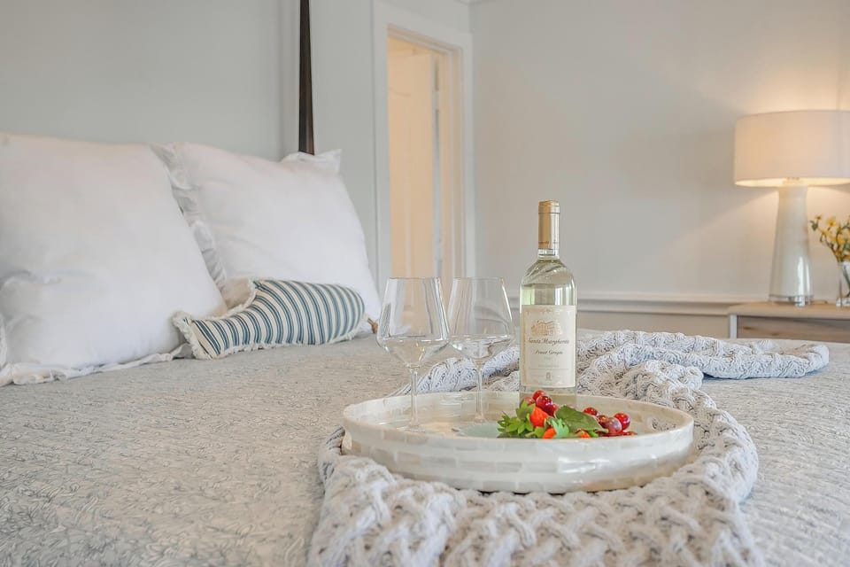 Relax in comfort with a touch of elegance and a bottle of wine.