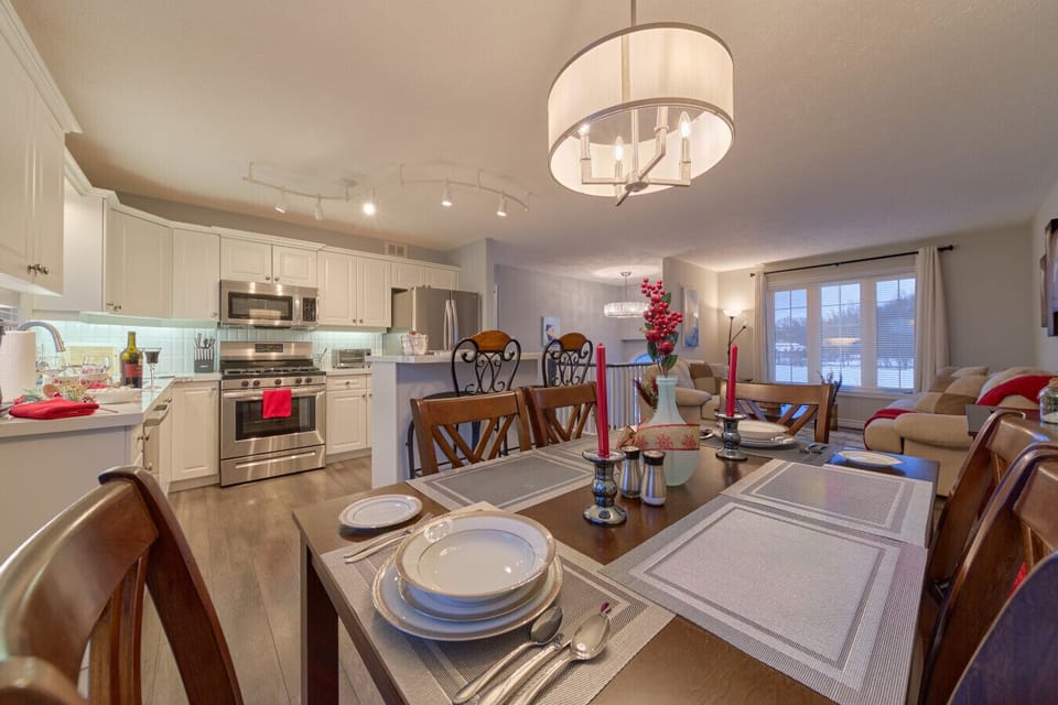 Open concept kitchen, dining room and living room