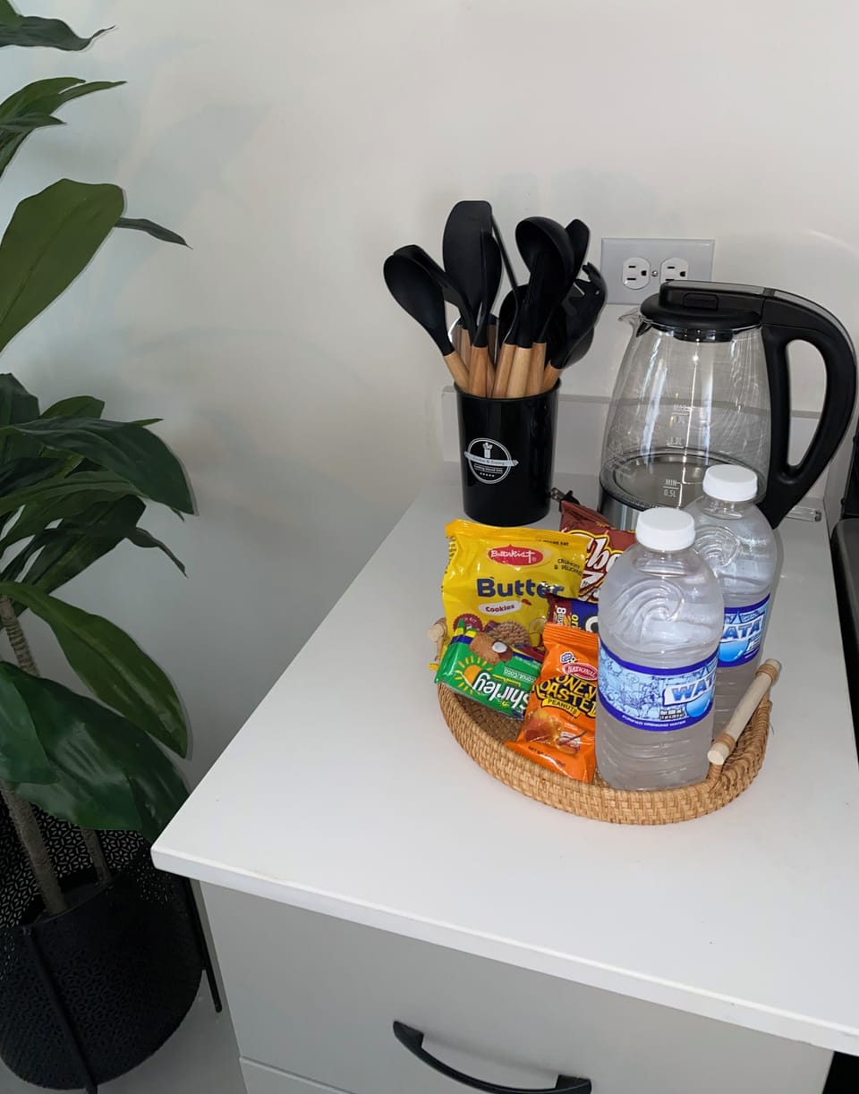 Complimentary snacks and tea supplies provided.