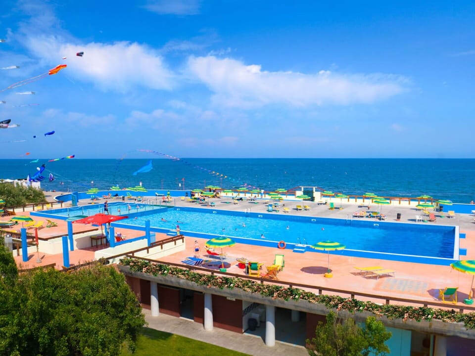 Cloud, Water, Sky, Plant, Blue, Azure, Swimming Pool, Leisure, Outdoor Furniture, Shade