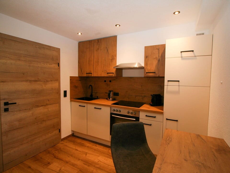Cabinetry, Countertop, Furniture, Building, Kitchen, Drawer, Interior Design, Wood, Kitchen Stove, Kitchen Appliance