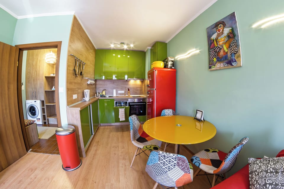 Kitchen has dishwasher, oven, stove, toaster, etc.. Washing machine in hall.