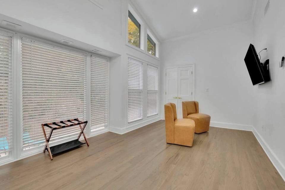 Enjoy a bright and tranquil bedroom with airy big windows.