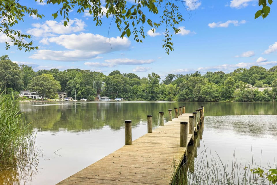 Peaceful neighborhood dock just moments away for scenic walks and waterfront views