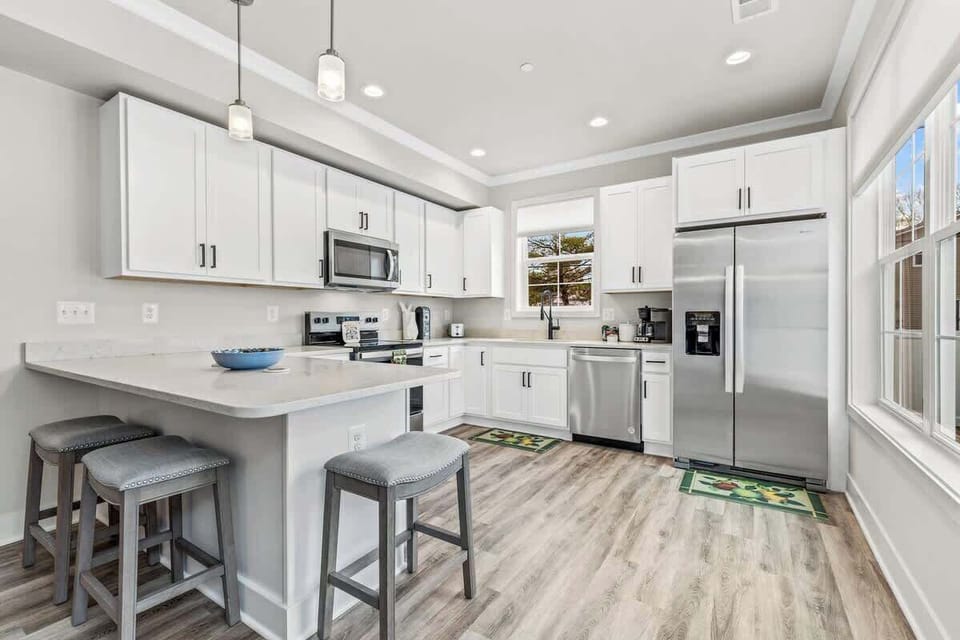 Spacious chef’s kitchen with seating at the island