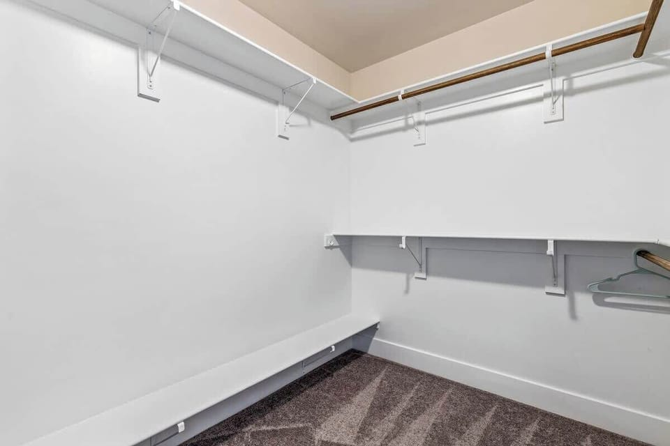 Walk-in closet with ample storage space