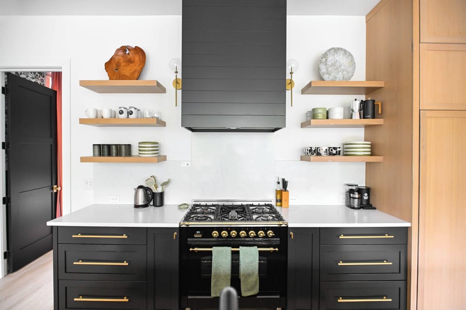 High-end appliances, sleek finishes, and a fully stocked coffee bar for your stay.