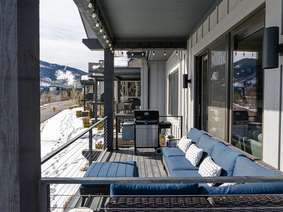Balcony off Main Living Area with Grill & Outdoor Seating