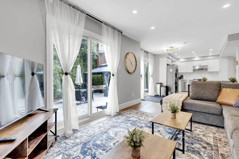 Spacious living room with modern design and ample seating