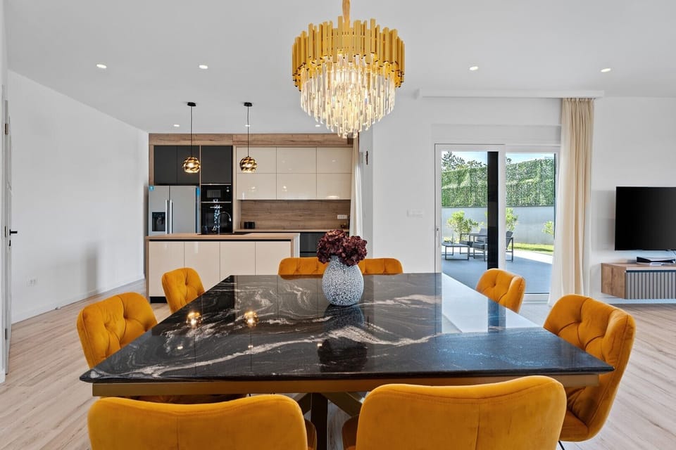 Open-plan living and dining areas provide ample space for socializing, relaxing, dining together