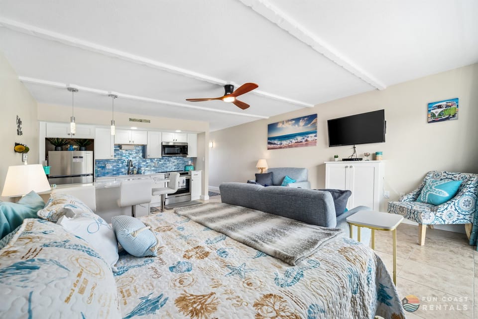 Sleeping/Living Area with Ample Seating and King Bed!