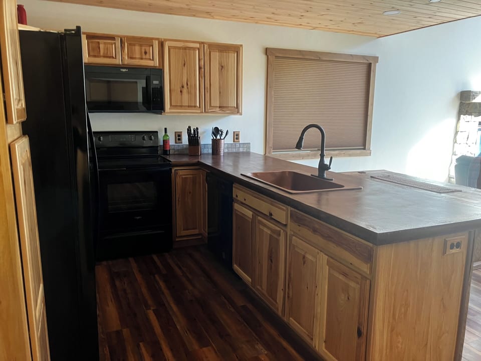 Kitchen with poured concrete countertops