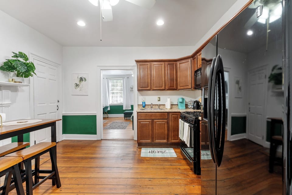 Sleek kitchen with modern appliances for easy cooking.
