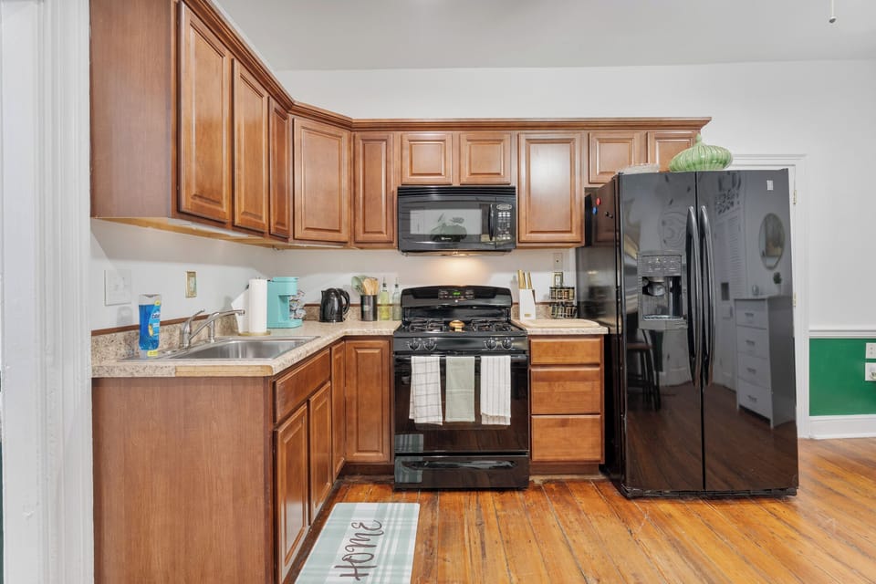 Cook and dine in style in our contemporary kitchen, featuring modern appliances.